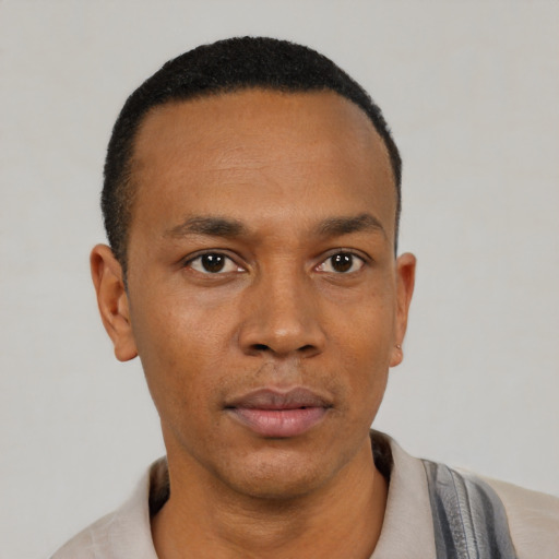 Neutral black young-adult male with short  black hair and brown eyes