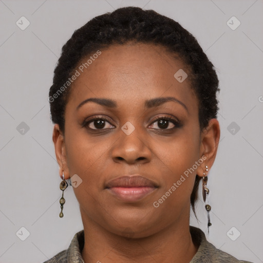 Joyful black young-adult female with short  black hair and brown eyes