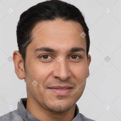 Joyful white adult male with short  brown hair and brown eyes