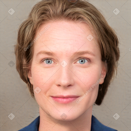 Joyful white adult female with medium  brown hair and blue eyes