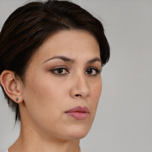 Neutral white young-adult female with medium  brown hair and brown eyes
