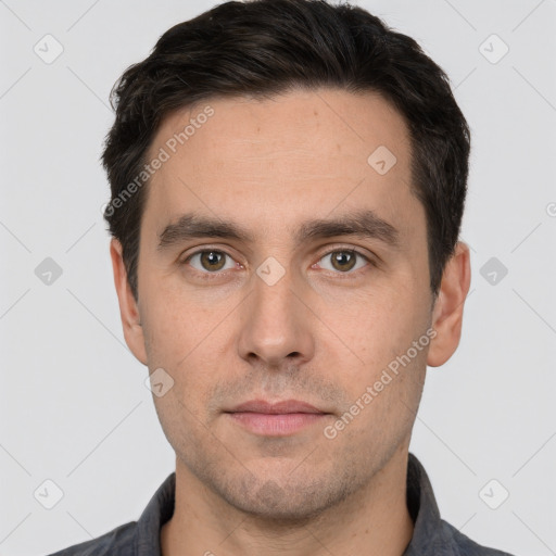 Neutral white adult male with short  black hair and brown eyes