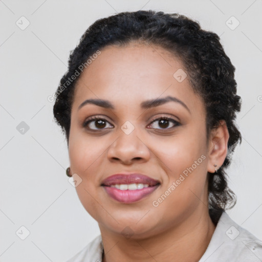 Joyful latino young-adult female with short  black hair and brown eyes