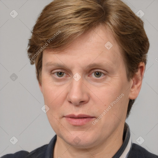 Joyful white adult male with short  brown hair and grey eyes