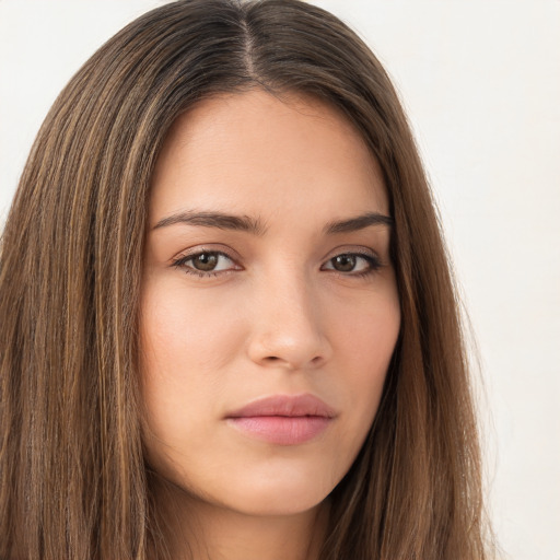 Neutral white young-adult female with long  brown hair and brown eyes