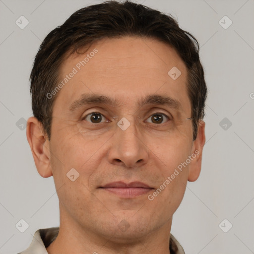 Joyful white adult male with short  brown hair and brown eyes