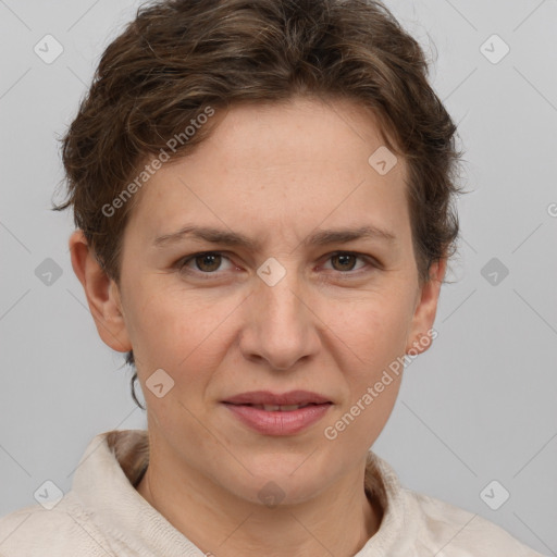 Joyful white adult female with short  brown hair and brown eyes