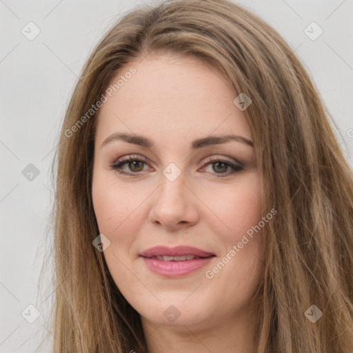 Joyful white young-adult female with long  brown hair and green eyes