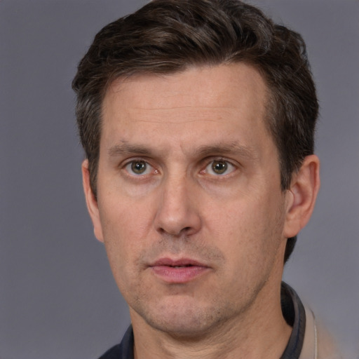 Neutral white adult male with short  brown hair and brown eyes