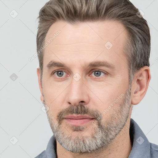 Neutral white adult male with short  brown hair and brown eyes