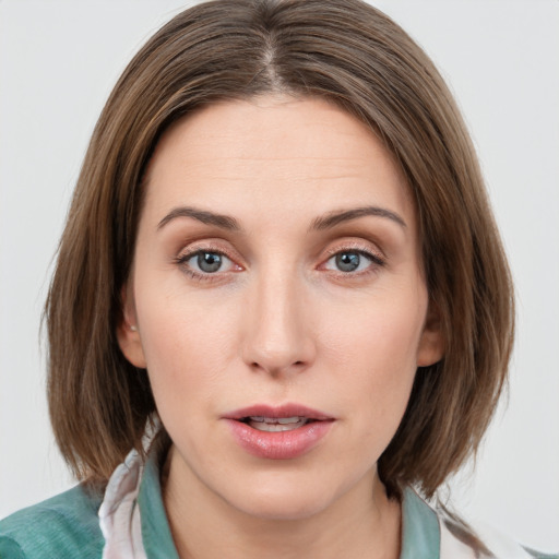 Neutral white young-adult female with medium  brown hair and blue eyes