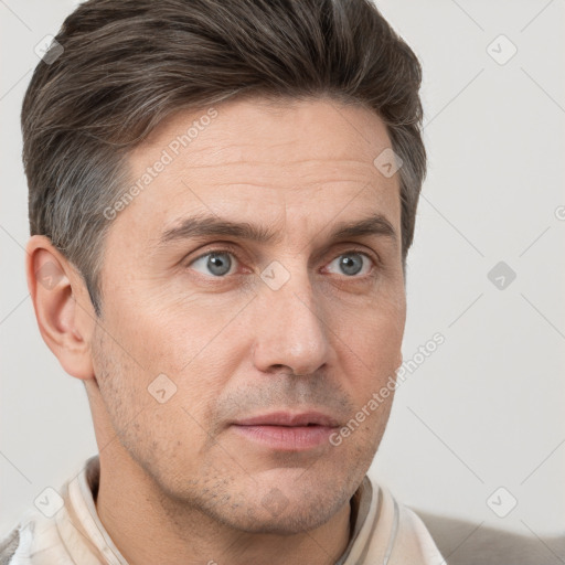 Neutral white adult male with short  brown hair and brown eyes