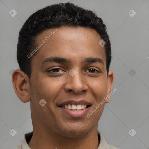 Joyful latino young-adult male with short  brown hair and brown eyes