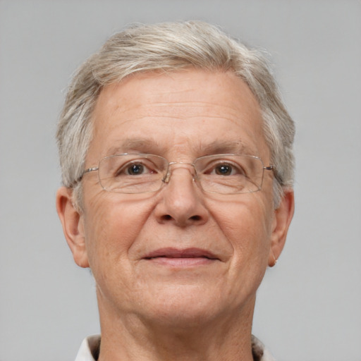 Neutral white middle-aged male with short  gray hair and brown eyes