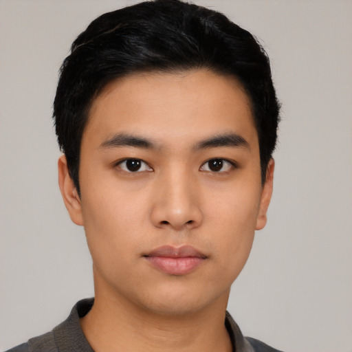 Neutral asian young-adult male with short  black hair and brown eyes