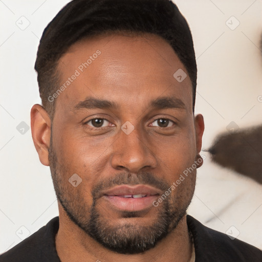 Joyful black young-adult male with short  brown hair and brown eyes