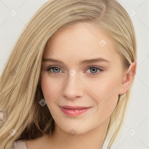 Joyful white young-adult female with long  brown hair and blue eyes