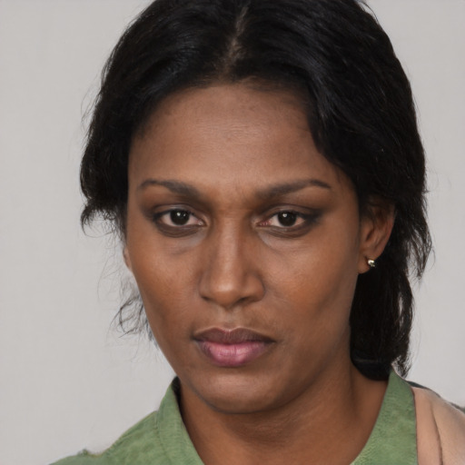 Neutral asian adult female with short  black hair and brown eyes