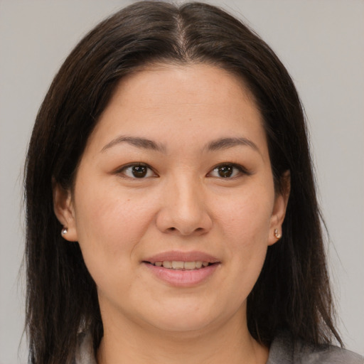 Joyful white young-adult female with medium  brown hair and brown eyes