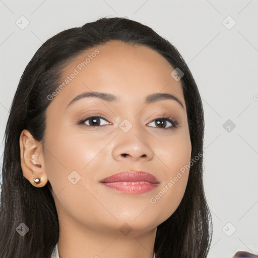 Joyful latino young-adult female with long  black hair and brown eyes