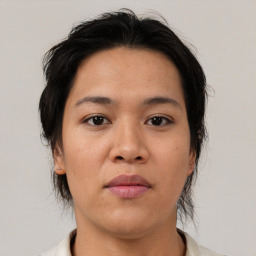 Neutral asian young-adult female with medium  brown hair and brown eyes