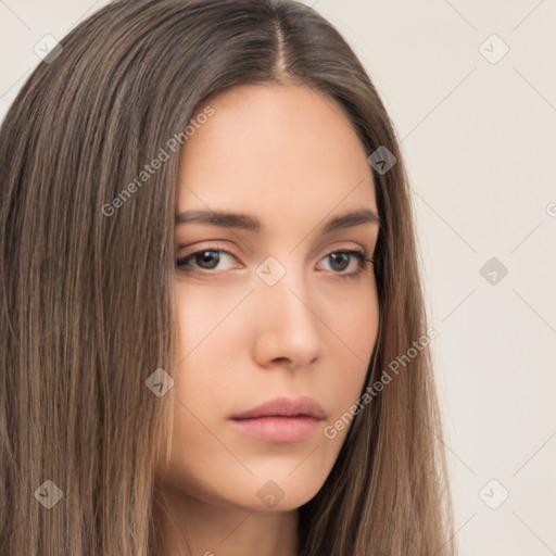 Neutral white young-adult female with long  brown hair and brown eyes