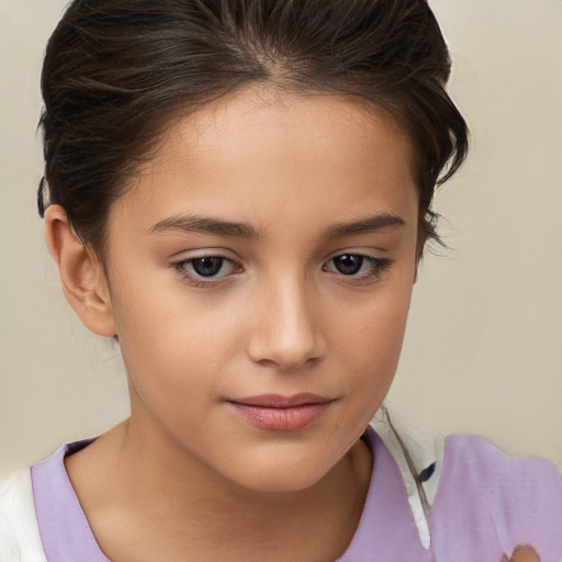 Joyful white child female with short  brown hair and brown eyes