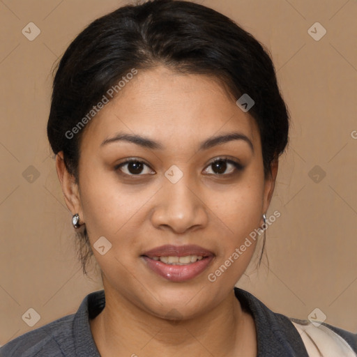 Joyful latino young-adult female with medium  brown hair and brown eyes