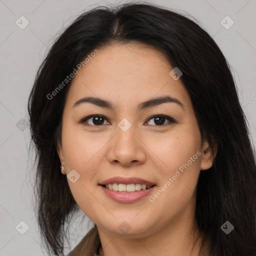 Joyful latino young-adult female with long  brown hair and brown eyes