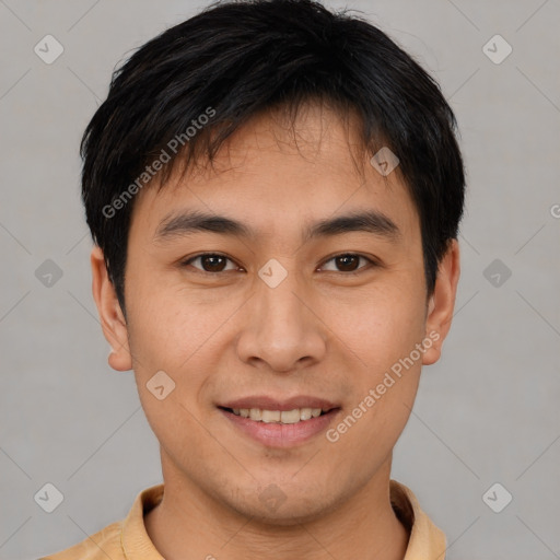 Joyful asian young-adult male with short  brown hair and brown eyes