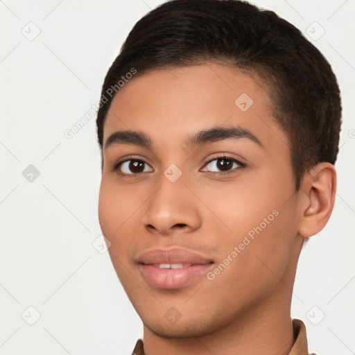 Joyful latino young-adult male with short  brown hair and brown eyes