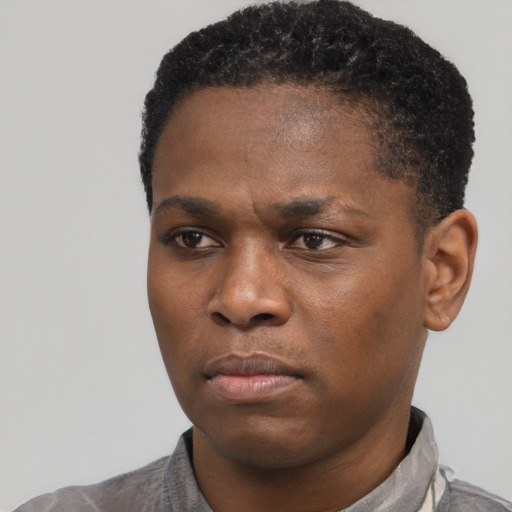 Neutral black young-adult male with short  black hair and brown eyes