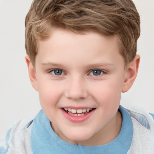 Joyful white child male with short  brown hair and grey eyes