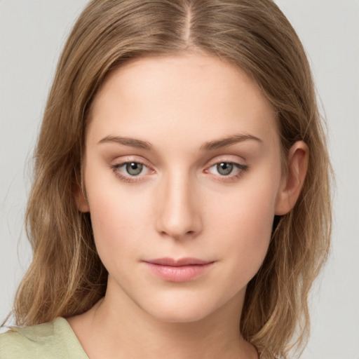 Neutral white young-adult female with medium  brown hair and green eyes