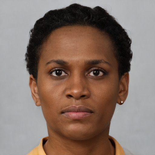 Neutral black young-adult female with short  brown hair and brown eyes