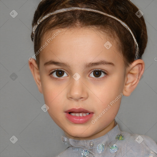 Joyful white child female with short  brown hair and brown eyes