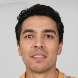 Neutral white young-adult male with short  black hair and brown eyes