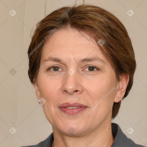 Joyful white adult female with medium  brown hair and grey eyes