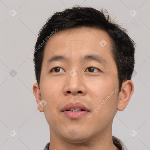 Neutral asian young-adult male with short  brown hair and brown eyes