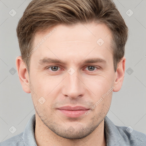 Neutral white young-adult male with short  brown hair and grey eyes