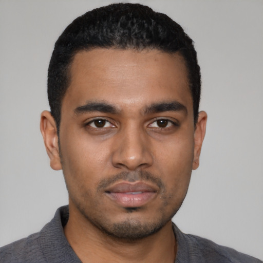 Neutral black young-adult male with short  black hair and brown eyes