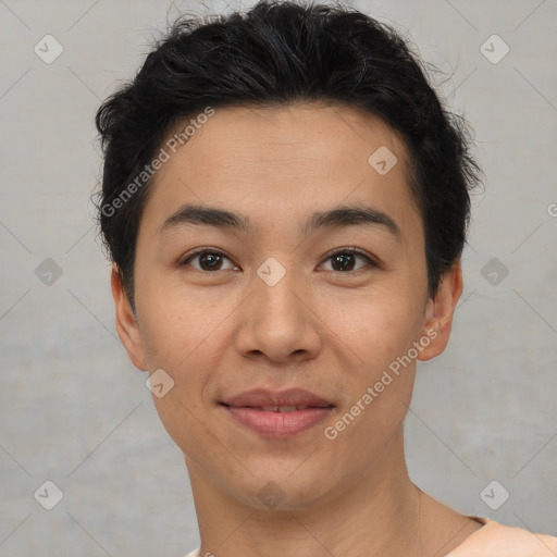 Joyful asian young-adult male with short  brown hair and brown eyes