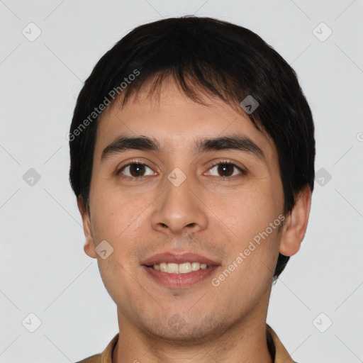 Joyful white young-adult male with short  black hair and brown eyes