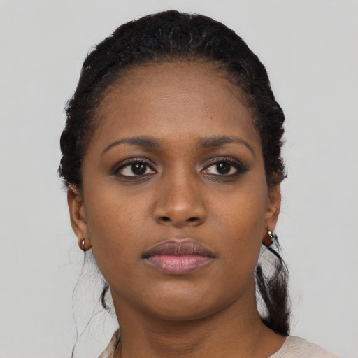 Neutral black young-adult female with short  black hair and brown eyes