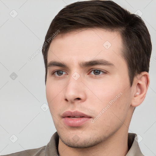 Neutral white young-adult male with short  brown hair and brown eyes