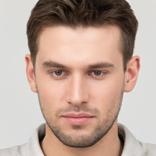 Neutral white young-adult male with short  brown hair and brown eyes