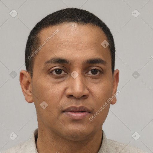 Neutral latino young-adult male with short  brown hair and brown eyes