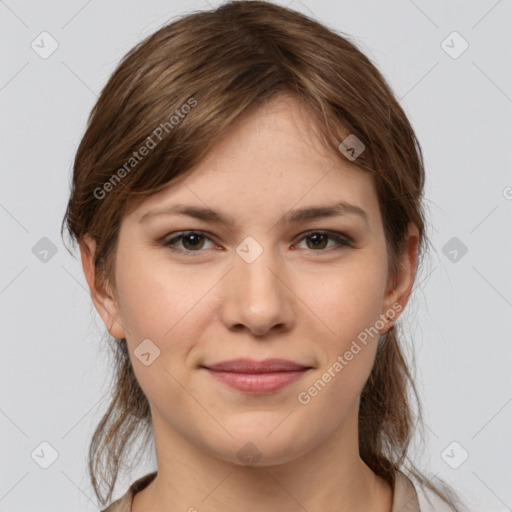 Joyful white young-adult female with medium  brown hair and grey eyes