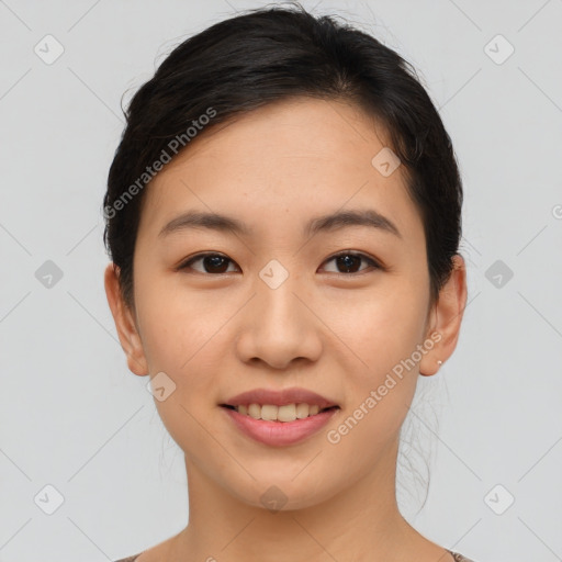 Joyful asian young-adult female with short  brown hair and brown eyes