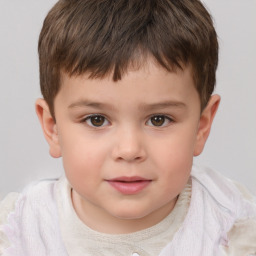 Joyful white child male with short  brown hair and brown eyes